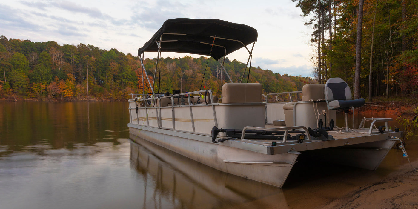 Pontoon Boat on shore